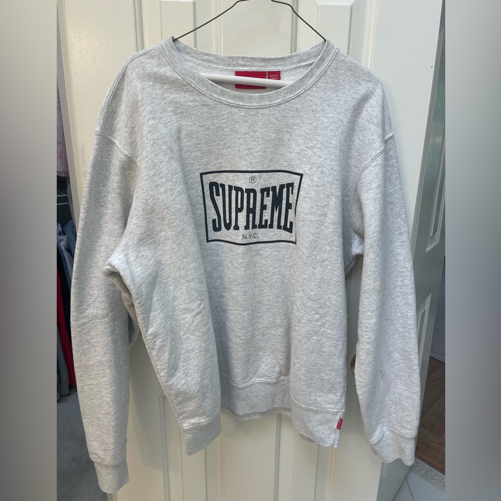 Grey Supreme box crew neck with black details. Size Large
